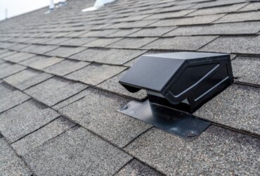 Static vent installed on a shingle roof for passive attic ventilation. attic insulation and roof ventilation
