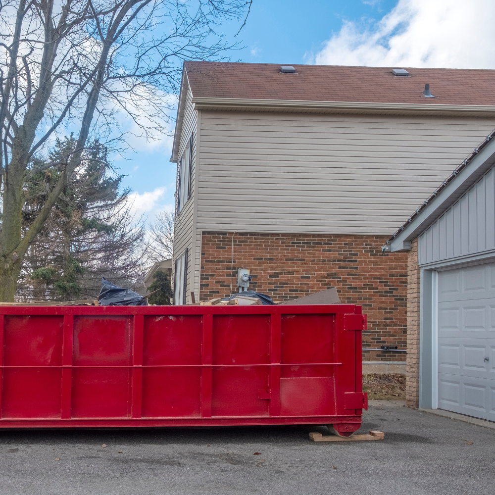 Dumpster in Driveway for Roof Replacement 1