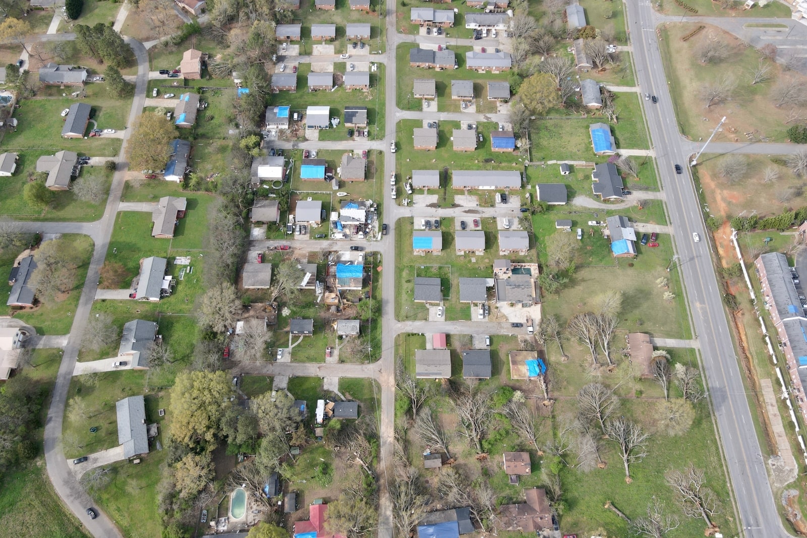 Homes with storm damage across a North Alabama neighborhood