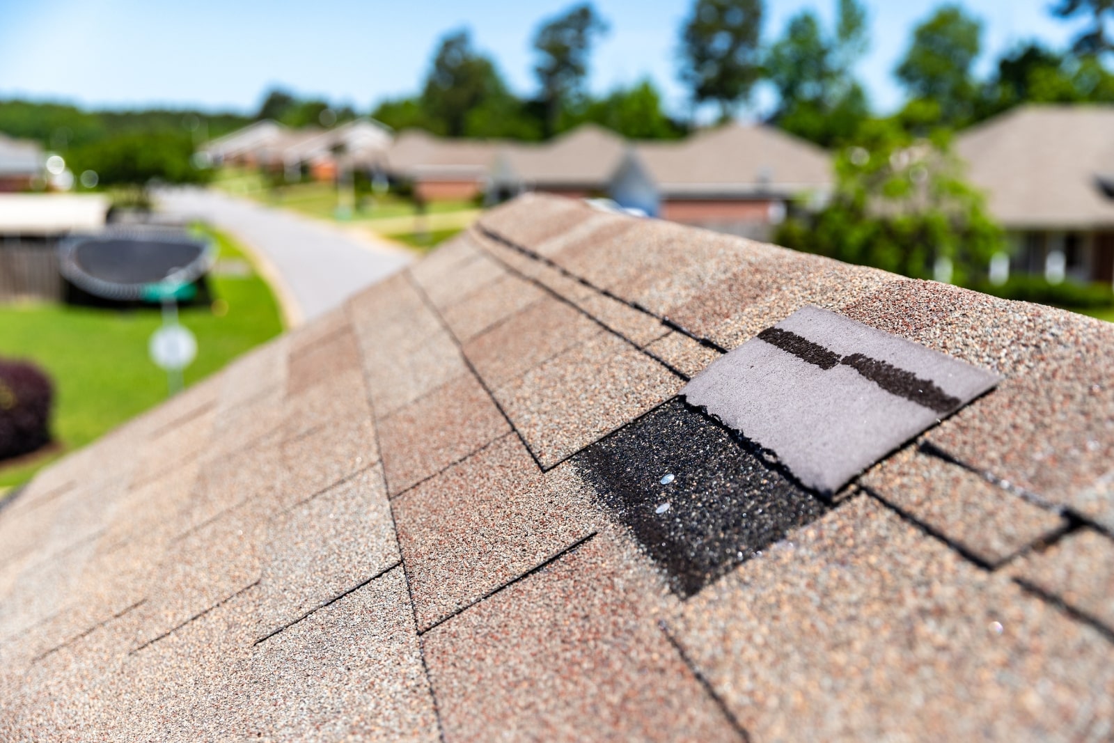Roof damage documented after a storm before a repair estimate