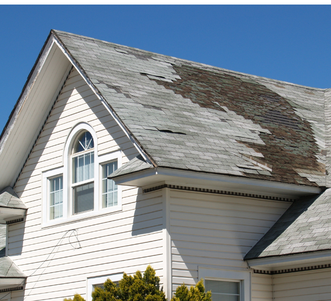 storm damage roof Huntsville AL showing hail impact marks on asphalt shingles