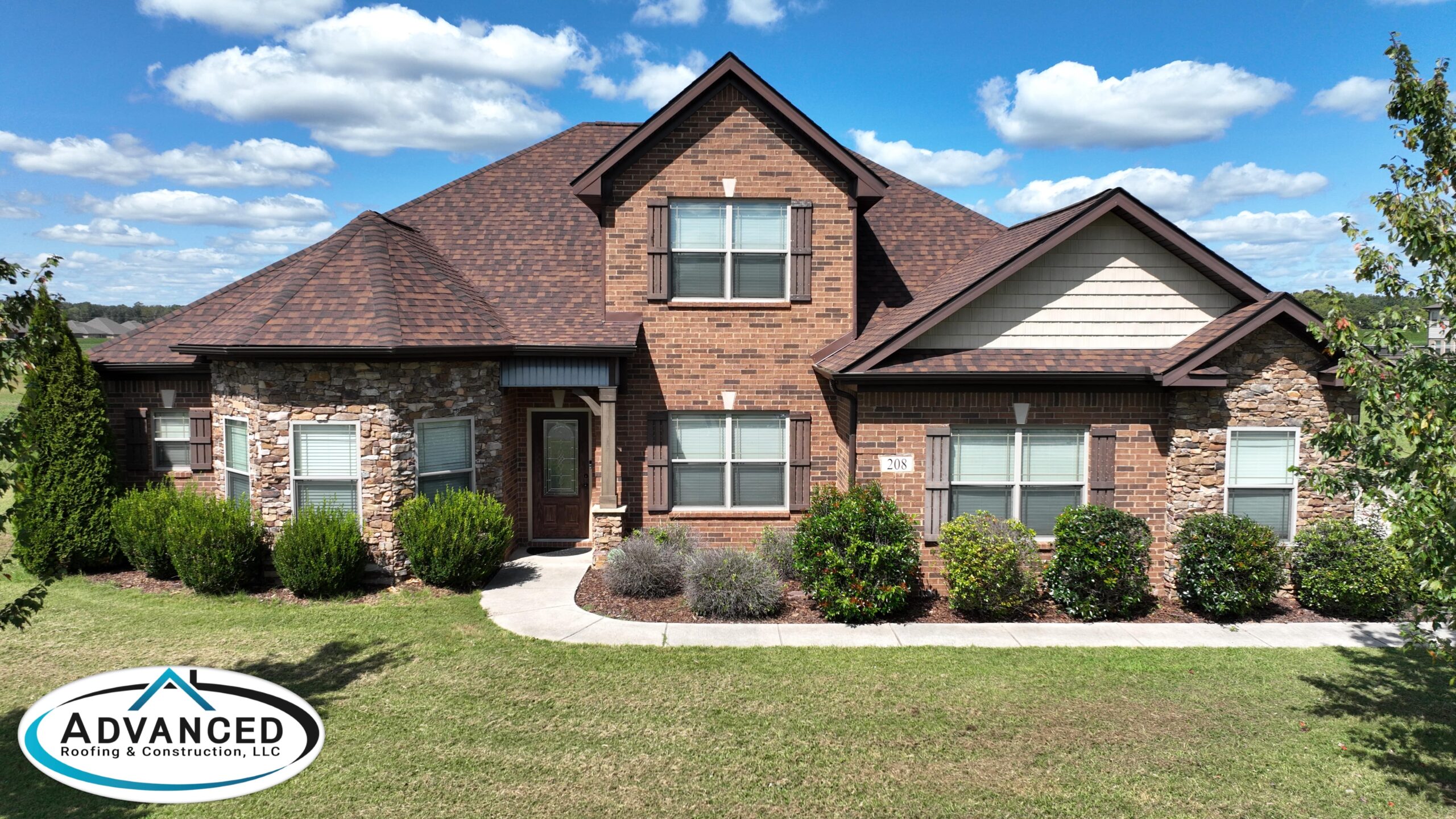 Repaired rooftop in Huntsville showcasing roof color energy efficiency Alabama benefits