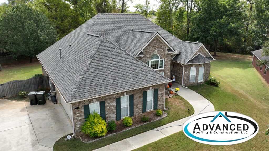 Newly replaced shingles on a North Alabama house following professional repair after storm damage roof insurance claims