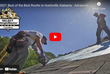 Roofer nailing shingles with Best of the Best award badge