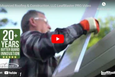 Installer fitting LeafBlaster PRO gutter guard on roof