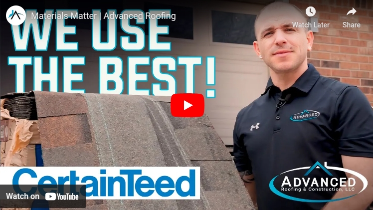 Man stands next to roof shingle board with "We use the best" text