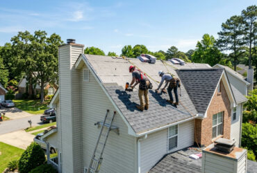 Roofing crew performing roof repair Huntsville AL on a North Alabama home